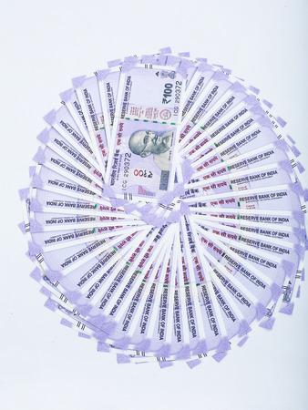 Picture of new 100 rupees notes. Isolated on the white background.