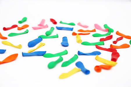 Portrait of colorful water balloons for holi fun. Isolated on the white background.の写真素材