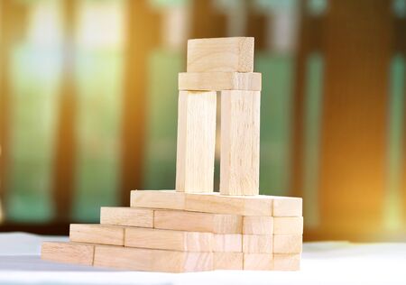 Wooden blocks- house. Isolated on white background.の写真素材