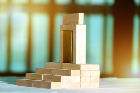 Wooden blocks- house. Isolated on white background.の写真素材