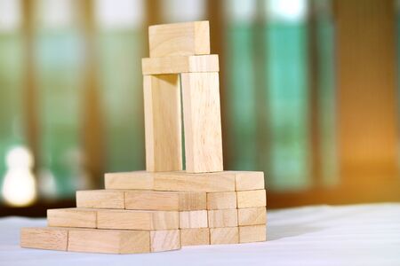 Wooden blocks- house. Isolated on white background.の写真素材
