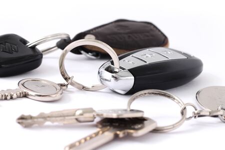 Picture of key with key ring. Isolated on white background.