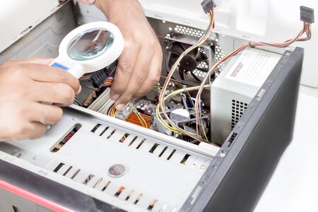 Picture of computer technician. Isolated on white background.の写真素材
