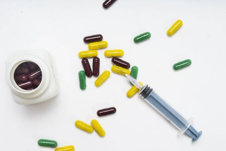 Picture of capsule medicine. Isolated on white background.の写真素材