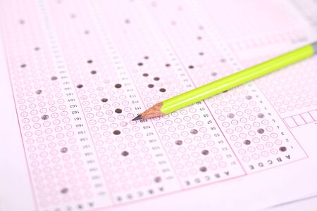 Picture of man filling OMR sheet.の写真素材