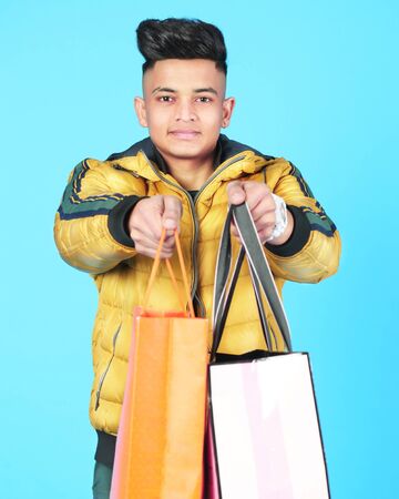 Picture of man with shopping bag. Isolated on white background.の写真素材
