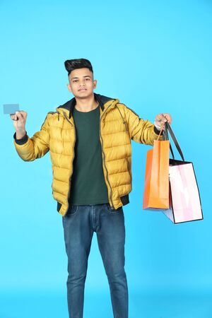 Picture of man with shopping bag. Isolated on white background.の写真素材