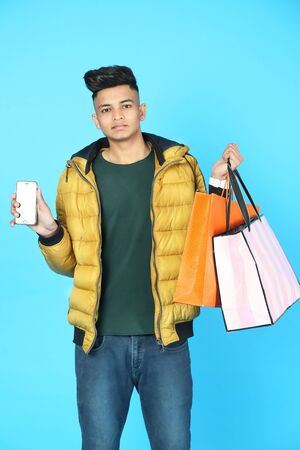 Picture of man with shopping bag. Isolated on white background.の写真素材