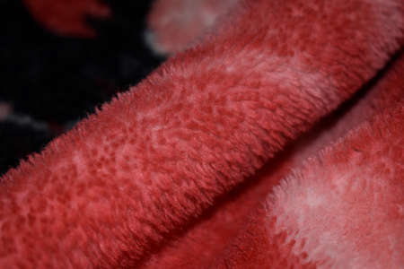 closeup view of red color soft cloth.の写真素材