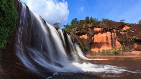 The waterfall in the hole in asia location の写真素材