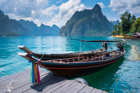 The boat in lake on Ratchapapar damの写真素材