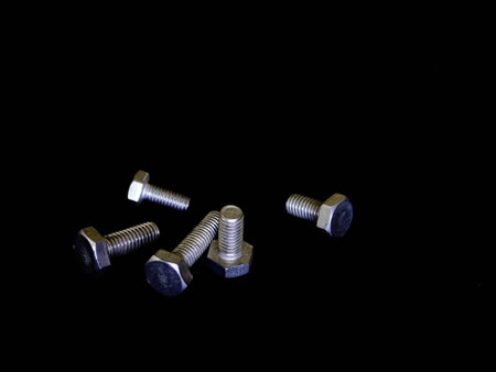 Bolts in the black backgroundの写真素材