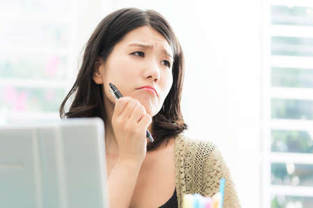A Japanese woman who suffers from a work place with a personal computer