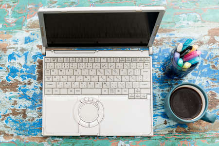 Laptops, stationery and coffee on your deskの写真素材