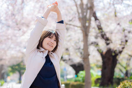 Woman stretching Spring imageの写真素材