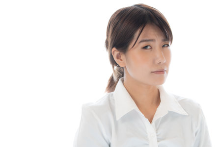 Portrait of a young business woman isolated on white background. asianの写真素材