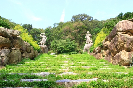 Natural stone landscaping in garden with stairs の写真素材