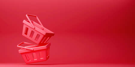 Red shopping baskets on red background. Retro design, business conceptの写真素材