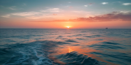Breathtaking view of the colourful sunset over calm ocean. AI generatedの素材
