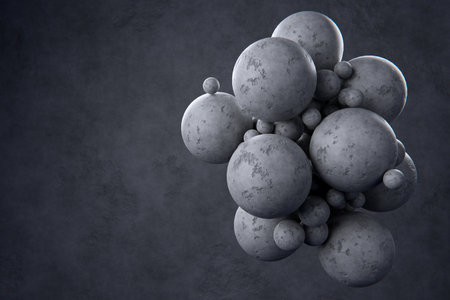 Abstract concrete balls on dark concrete background.