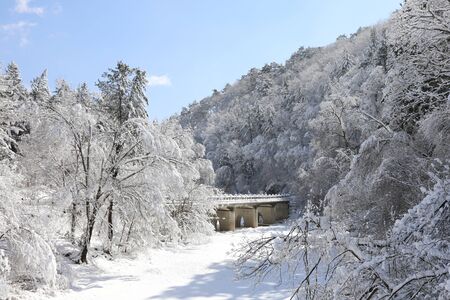 Beautiful winter landscape. Snowy mountains, trees, and bridge scenery. Odaesan National Park, Gangwon Province, Koreaの写真素材