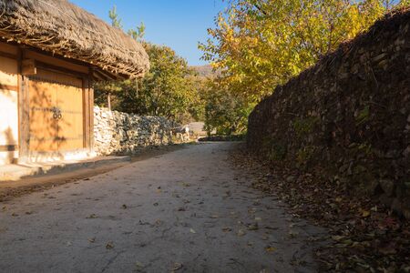 Korean traditional village and stone wall road. Traditional farm village in Asan Oeam folk village, South Koreaの写真素材