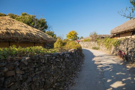 Korean traditional village and stone wall road. Traditional farm village in Asan Oeam folk village, South Koreaの写真素材