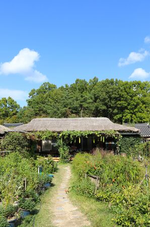 Korean traditional thatched house. Mooseom folk village, Youngju, South Koreaの写真素材