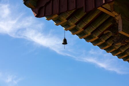 Korean traditional temple roof and blue sky
