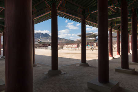 Gyeongbokgung Palace, Seoul, South Korea-February 27, 2020: Korean traditional architecture and guard inside Gyeongbokgung Palaceのeditorial素材