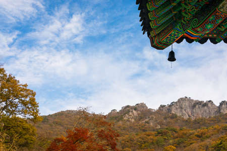 Autumn mountain and beautiful Korean temple roof landscape. Naejangsan National Park, South Korea.の写真素材