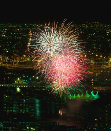 Explosion of fireworks over the harbour at docklands in Melbourneの写真素材