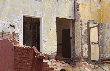 demolotion site with a partly destroyed buildingの写真素材
