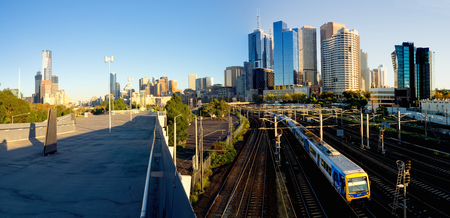 panorama of melbourne with train and buildingsの写真素材