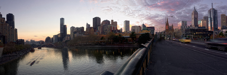 melbourne at sunset looking over ht princess bridge on the yarra riverの写真素材