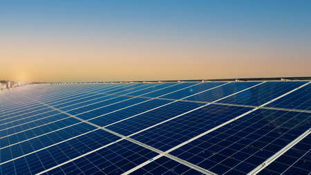 Diry solar cell panels under the evening sun lightの写真素材