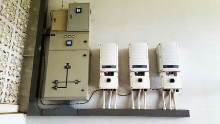 Control panel of a solar cell system on white wallの写真素材