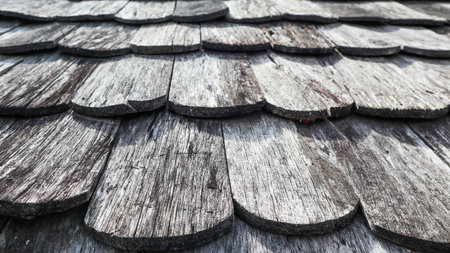 Close up view of dark texture vintage wooden roof tilesの写真素材