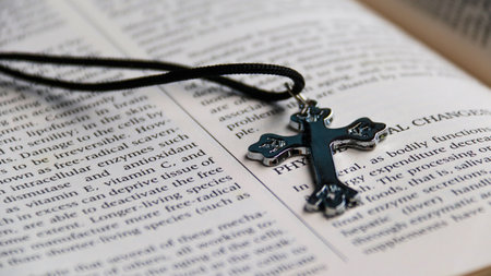 Close-up of a cross on a holy bible.の写真素材