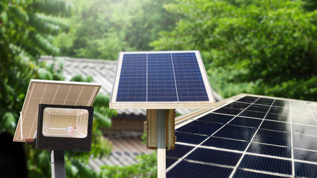 Small solar cell panels installed for provide power for farming lightの写真素材