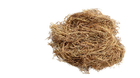 cut out image of lump of dry straw with clipping paths, against white background, highlighting the texture and individual strands for versatile design applications.の写真素材