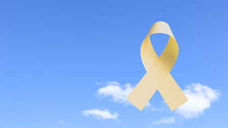 Yellow ribbon, symbolizing bone cancer awareness. The ribbon represents hope and unity, raising awareness and support for those affected by cancer, fostering understanding and prevention.の写真素材