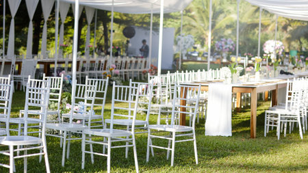 Tables and chairs dinning in wedding partyの写真素材