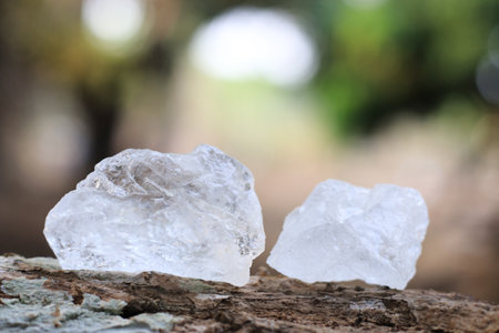 Crystal clear alum cubes or Potassium alum in on rough surface chemical compound substance concept for beauty spa and underarm treatmentの写真素材