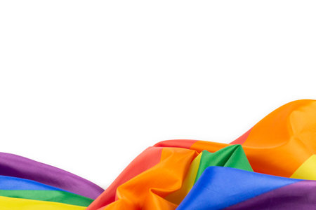 Colorful rainbow flag on white background. Concept of cheering LGBT communities all over the worldの写真素材