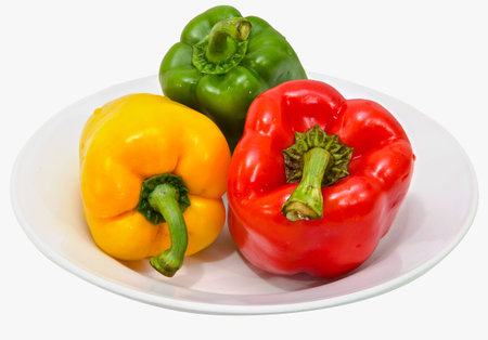 the three colored peppers on the plate
