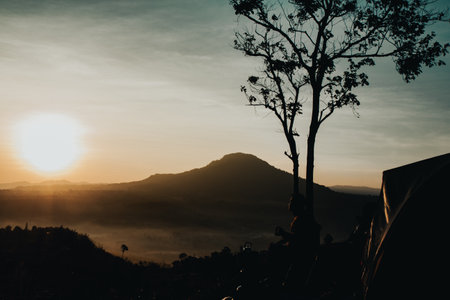View Point : tourists waiting for sunrise on mountaintop with sea of mist at Khao-kho in Phetchabun National park, Thailandの写真素材