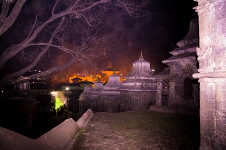 Hindu temple Pashupatinath at night light, Votive temples and shrines in a row at Pashupatinath Temple Kathmandu Nepal.の写真素材