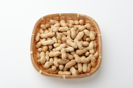 Dried peanuts on white backgroundの写真素材