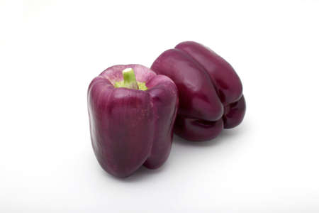Purple paprika on white background.の写真素材